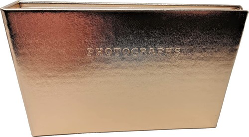 Gold photo album holds - -,